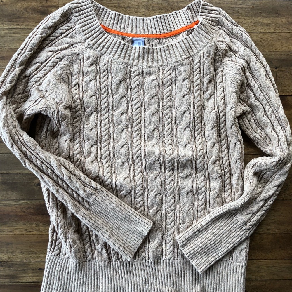 Cable knit sweater.